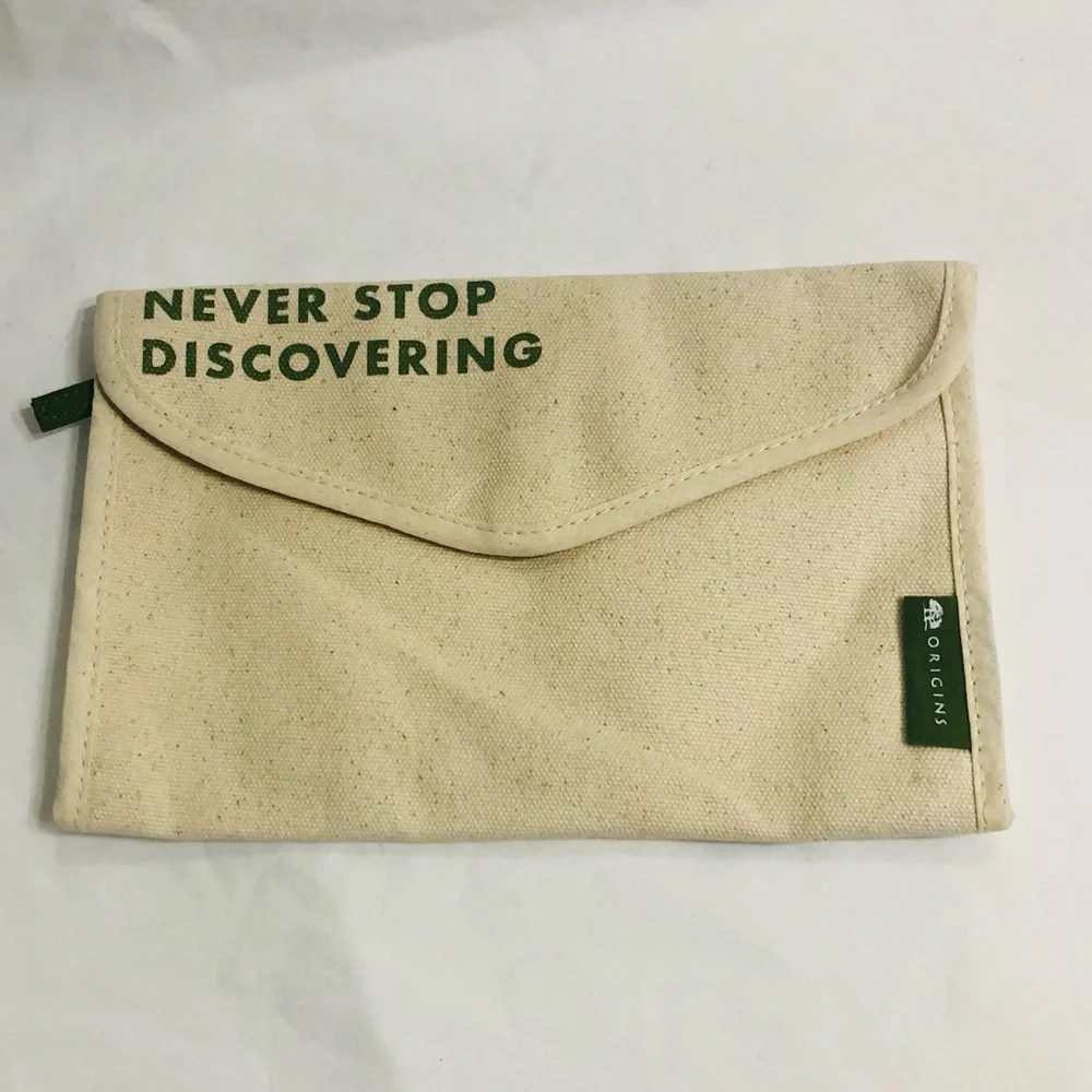Origins cosmetics jewelry canvas pouch Never Stop Discovering beige 10”X 6 1/2”